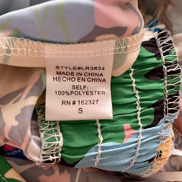 Multi colored floral romper. Size- SMALL - Picture 5 of 5